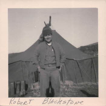 Robert Blackstone in front of tent
