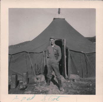 Posing in front of tent