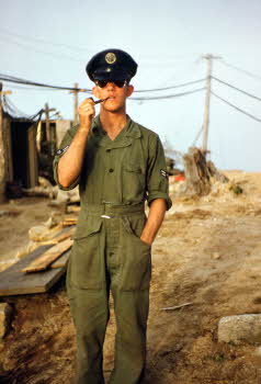 Bert Crowson wearing captain's hat and sunglasses