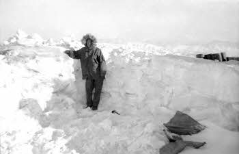 Bert Crowson wearing winter jacket with shoulder-high snows