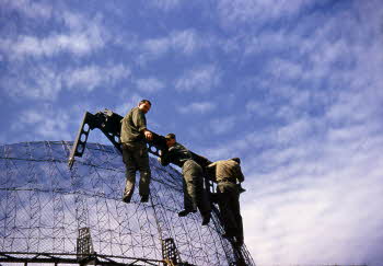 Three soldiers maintaining CPS-5 radar
