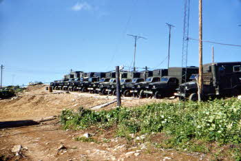 Communication trucks in a line