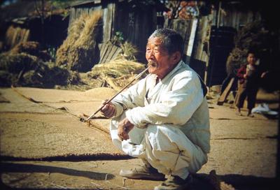Korean old-timer with bamboo pipe