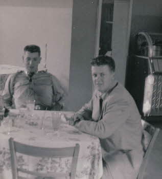 Garry Rockburn at a table in uniform