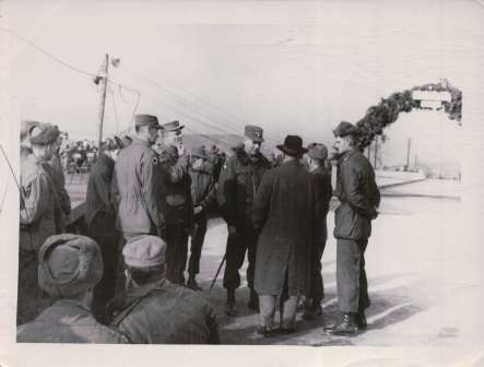 Gen. Taylor talking to the person of Korean national assembly	