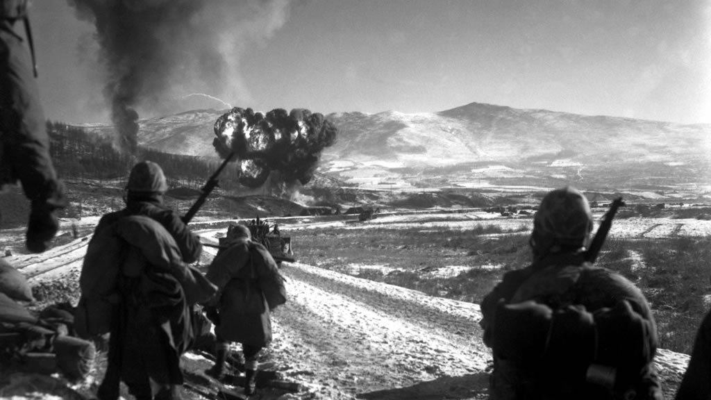 soliders marching toward explosion in winter