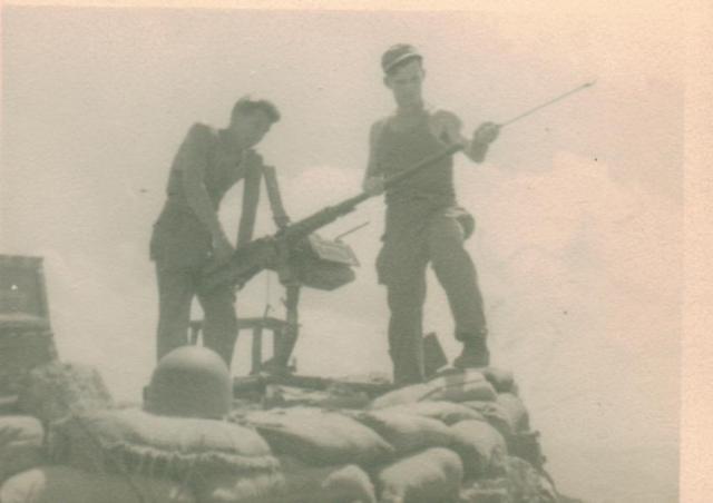 Two Soldiers with a Machine Gun