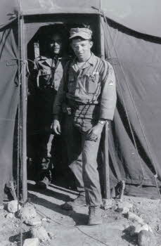 James Low coming out of tent