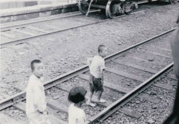 Korean kids on railroad