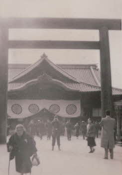 Soldiers sightseeing in a traditional Japanese building