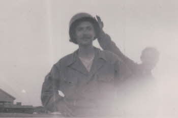 A soldier with mustache and helmet