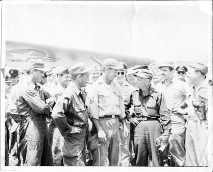 51st FIW 2nd frm L COL Gabreski CO #4 with radio pilot that had been shot down & rescued
