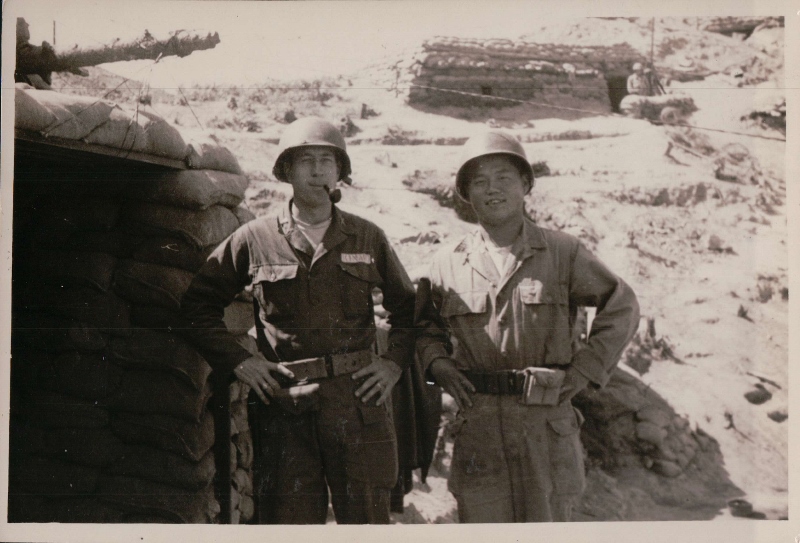 Larry Kinard (Left) standing with KATUSA