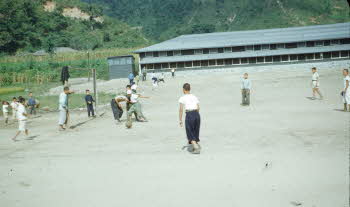 Korean kids playing soccer at the Korean school by U.S. military