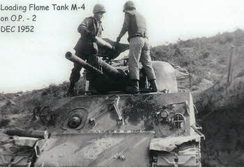 Two soldiers loading Flame Tank M-4 on O.P. -2