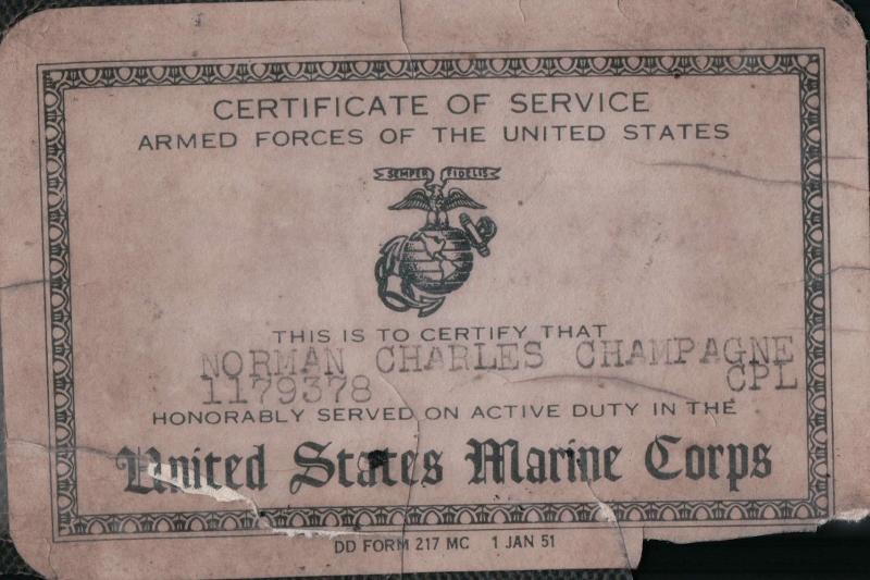 Champagne's Certificate of Service, which is proof that Champagne honorably served in the United States Marine Corps.