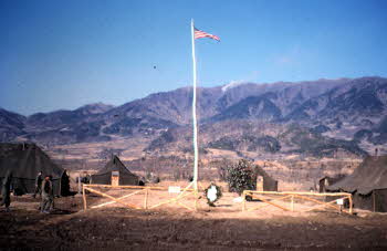 View of our Co. Dog reserve area and tents of U.S. Flag and Christmas tree, view to N.NE.