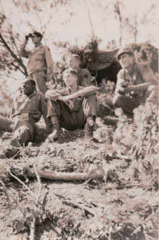 (from left to right) Crider, Camarillo (standing), Peter Doyle, Berns (in back, seated), Clodfelder (at right), MLR at Kumhwa North Korea
