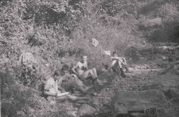 Bathing in Creek (from left to right) Staton, Chakmakjian, Berns, and Esbernet