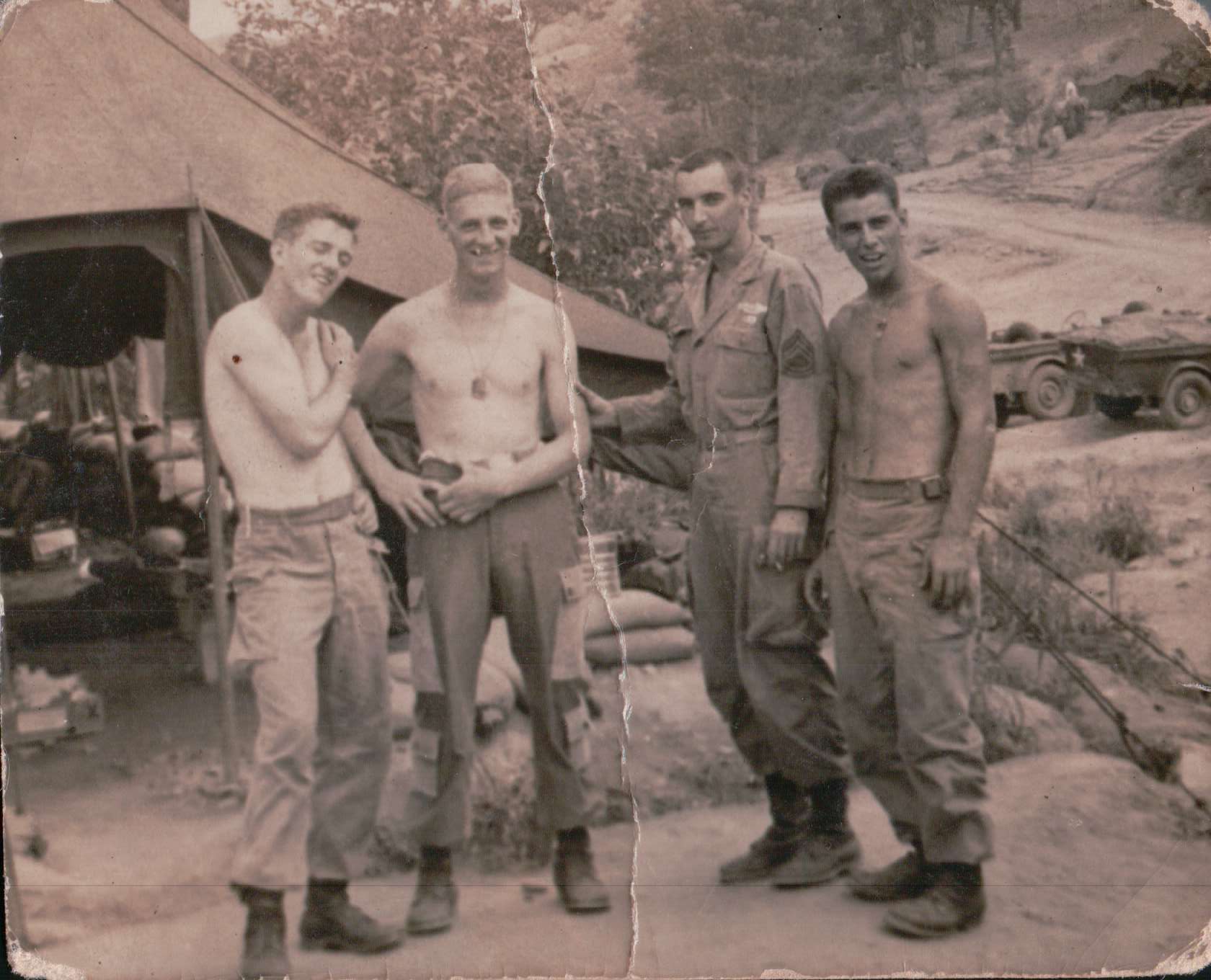 Auletti with friends while off the line in between battles. Taken 1952