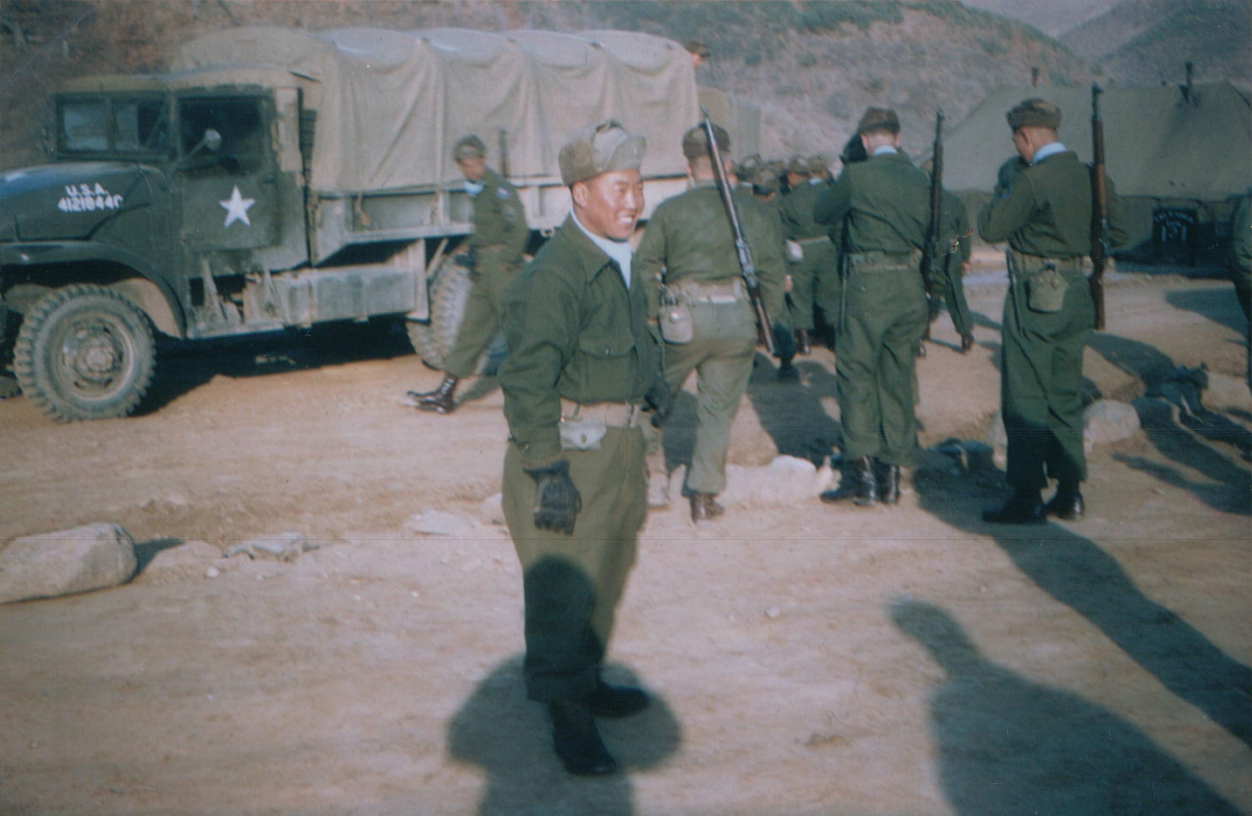 A KATUSA smiling in his military uniform.