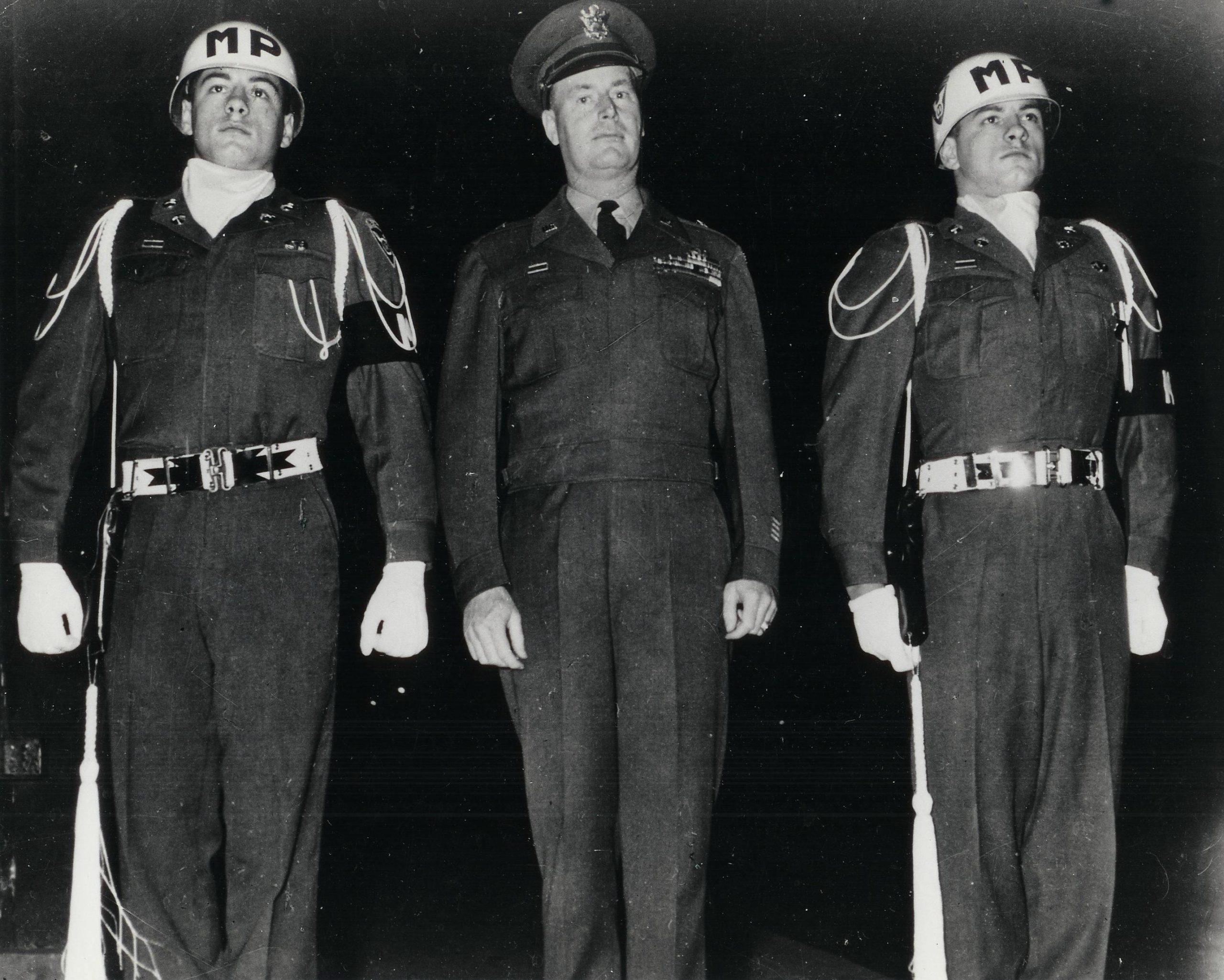 A picture of Robert and Richard, both age 17, with the 11th Airborne Division commander in Sendai Japan 1947.