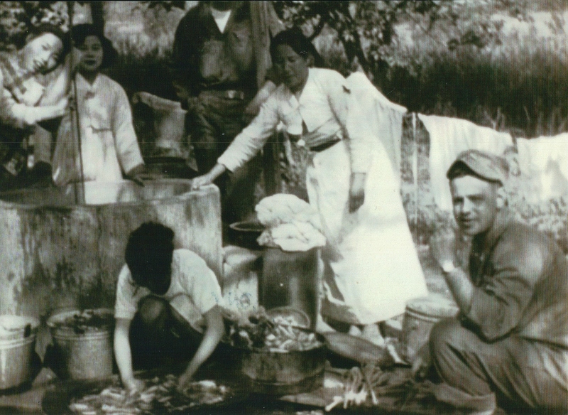 Nuzzo with the villagers collecting water from the Sambatt Village well near Chuncheon in 1954.