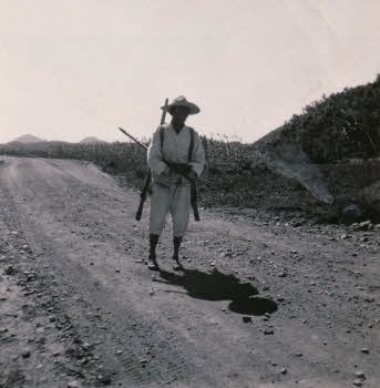 A Korean man carrying a Korean A-frame