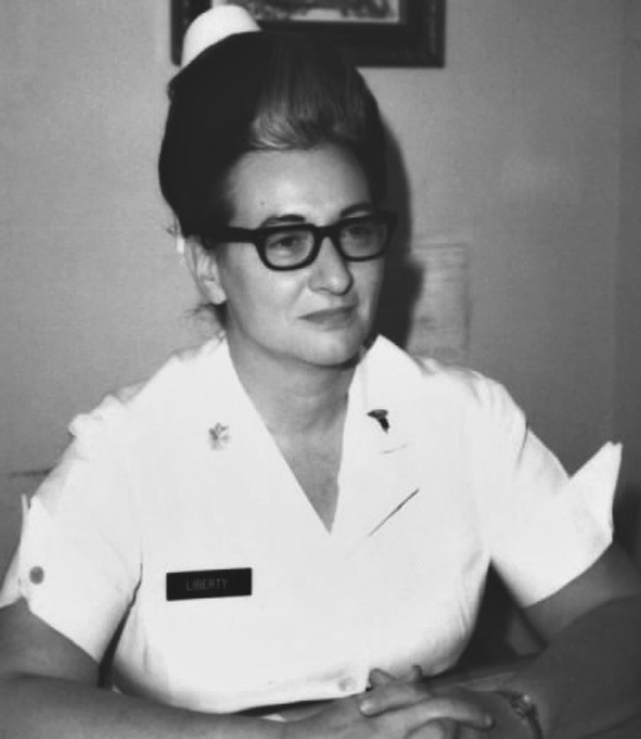 [Front]: Frances Liberty in uniform.