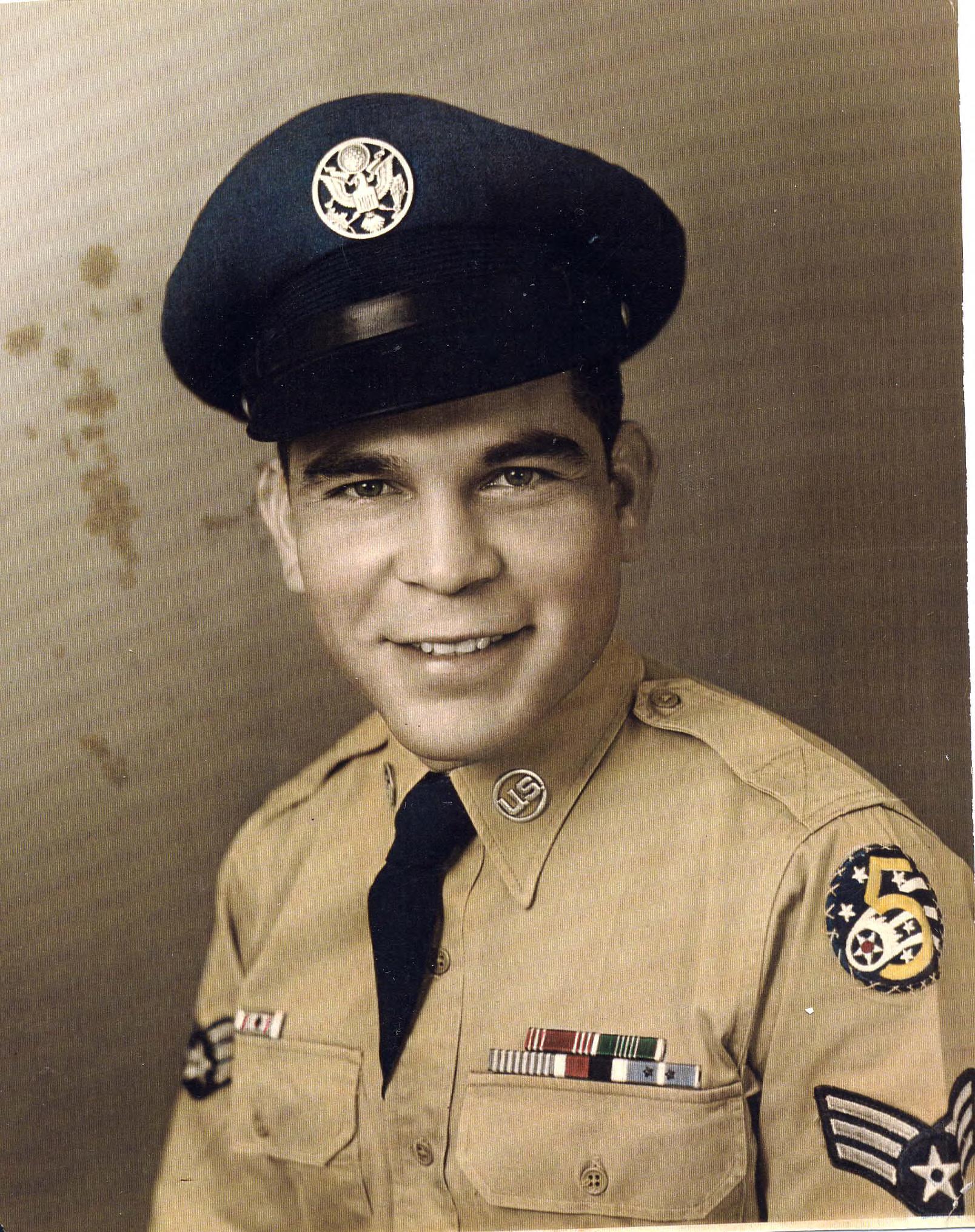 [Front]: color digital print of Raymond Ayon in uniform 